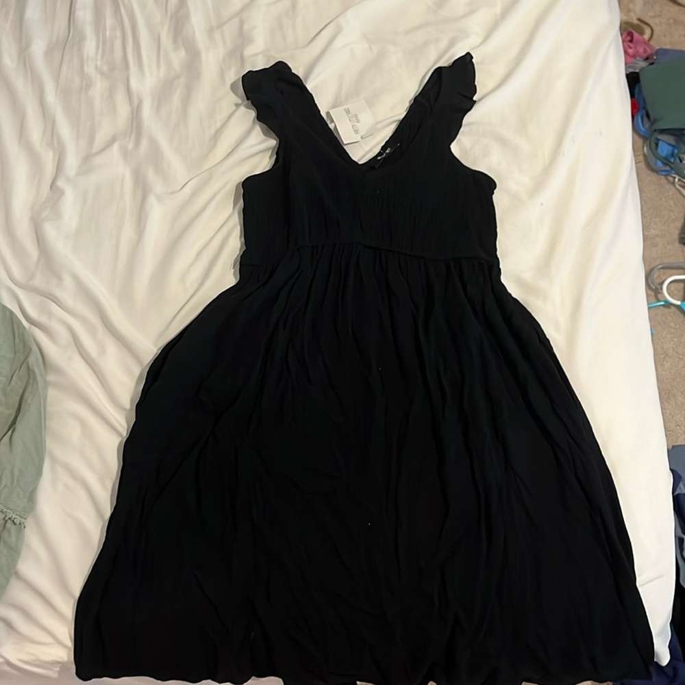 Pretty little things boutique, flowy black summer dress with pockets